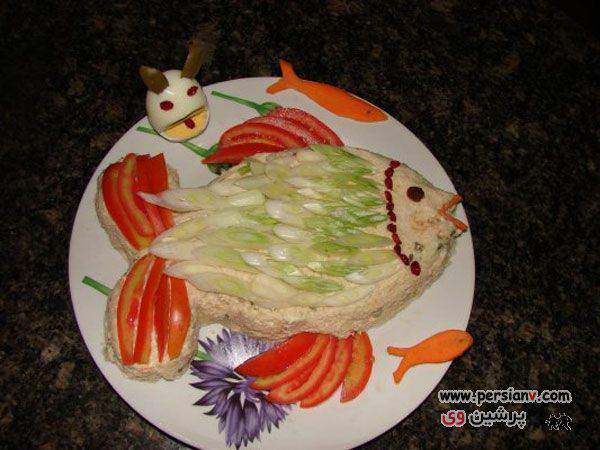 image تصویری سالاد سیب زمینی به شکل ماهی با گوجه و هویج