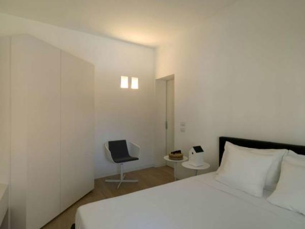 image تصویری دکوراسیون مدرن و سفید آپارتمان کوچک