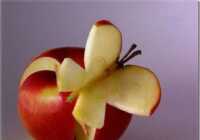 image برش سیب شکل پروانه تزیین سیب
