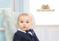 image عکس زیبا از یک پسر بچه تپل چشم آبی با کت و شلوار